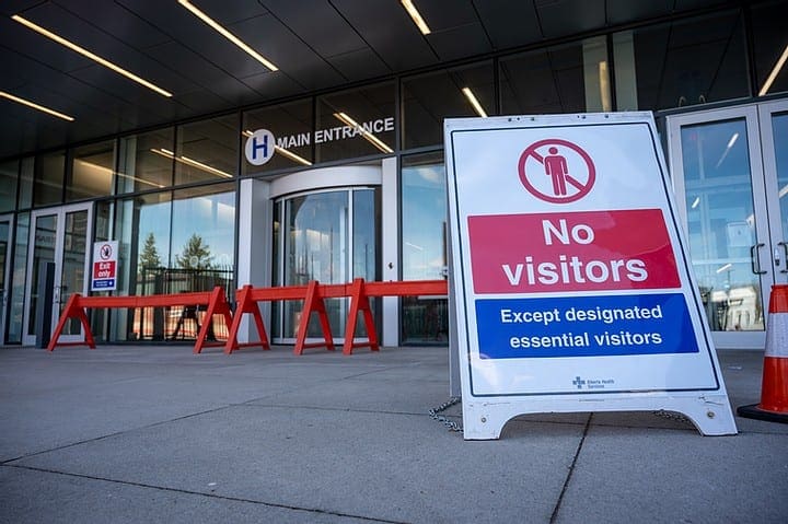No Visitors Sign In Front of an Office No Visitors Sign In Front of an Office