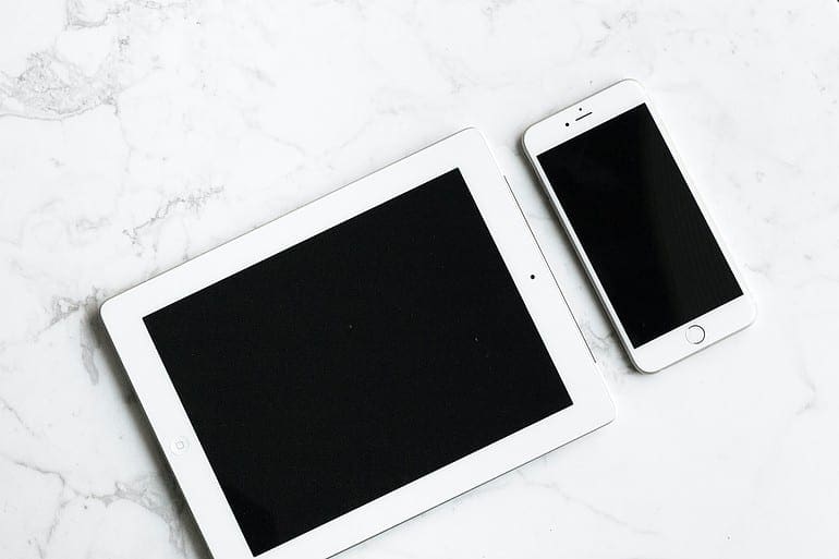 iPad and iPhone on a Desk iPad and iPhone on a Desk