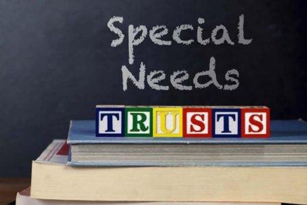 Words Special Needs written on chalkboard Words Special Needs written on chalkboard