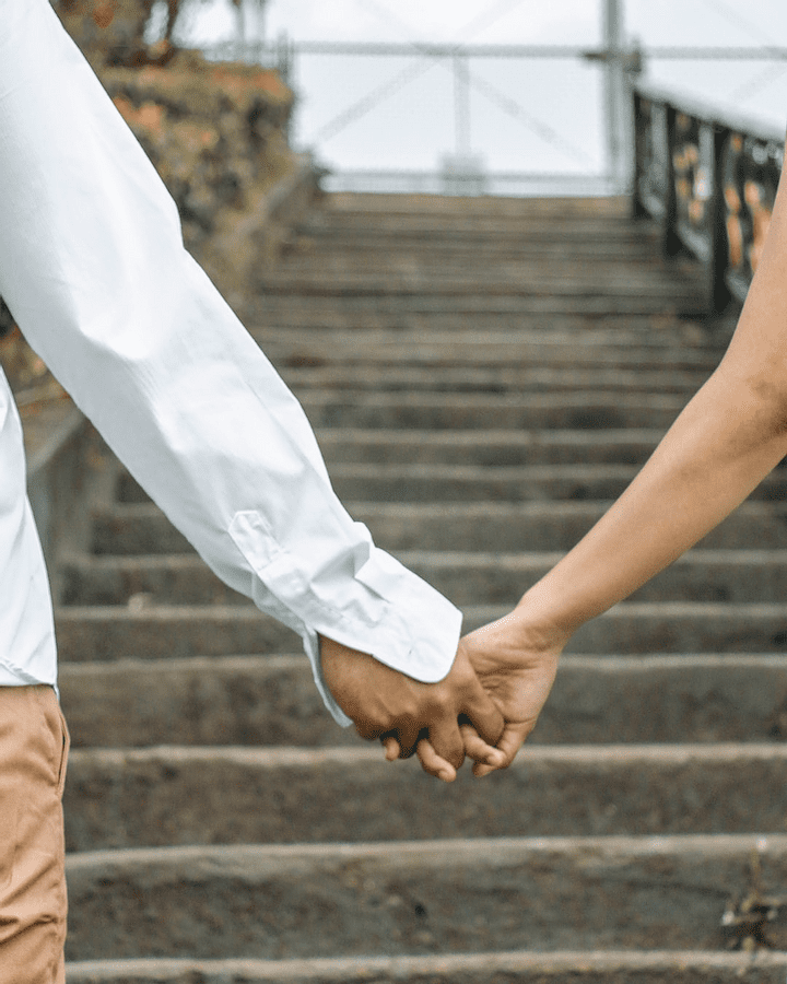Couple holding hands Couple holding hands