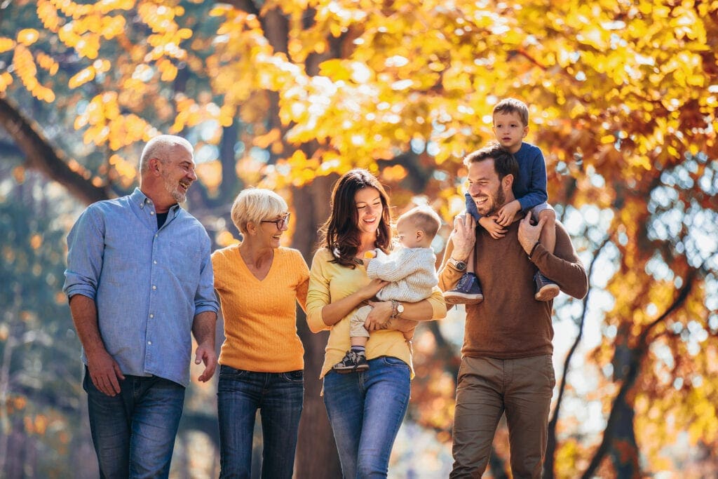 Multl generation family in autumn park having fun Multl generation family in autumn park having fun